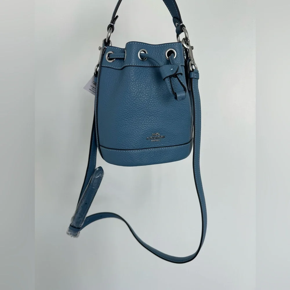 Coach light blue bucket bag
NWT prestine condition
Original price $328 - Picture 4 of 6